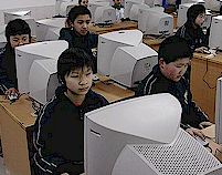 Students at the Liuyang Middle School in Liuyang, China work on computers.